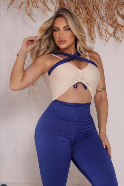 Beige Jumpsuit Top with Front Cross Straps and Blue Leggings - Image 2